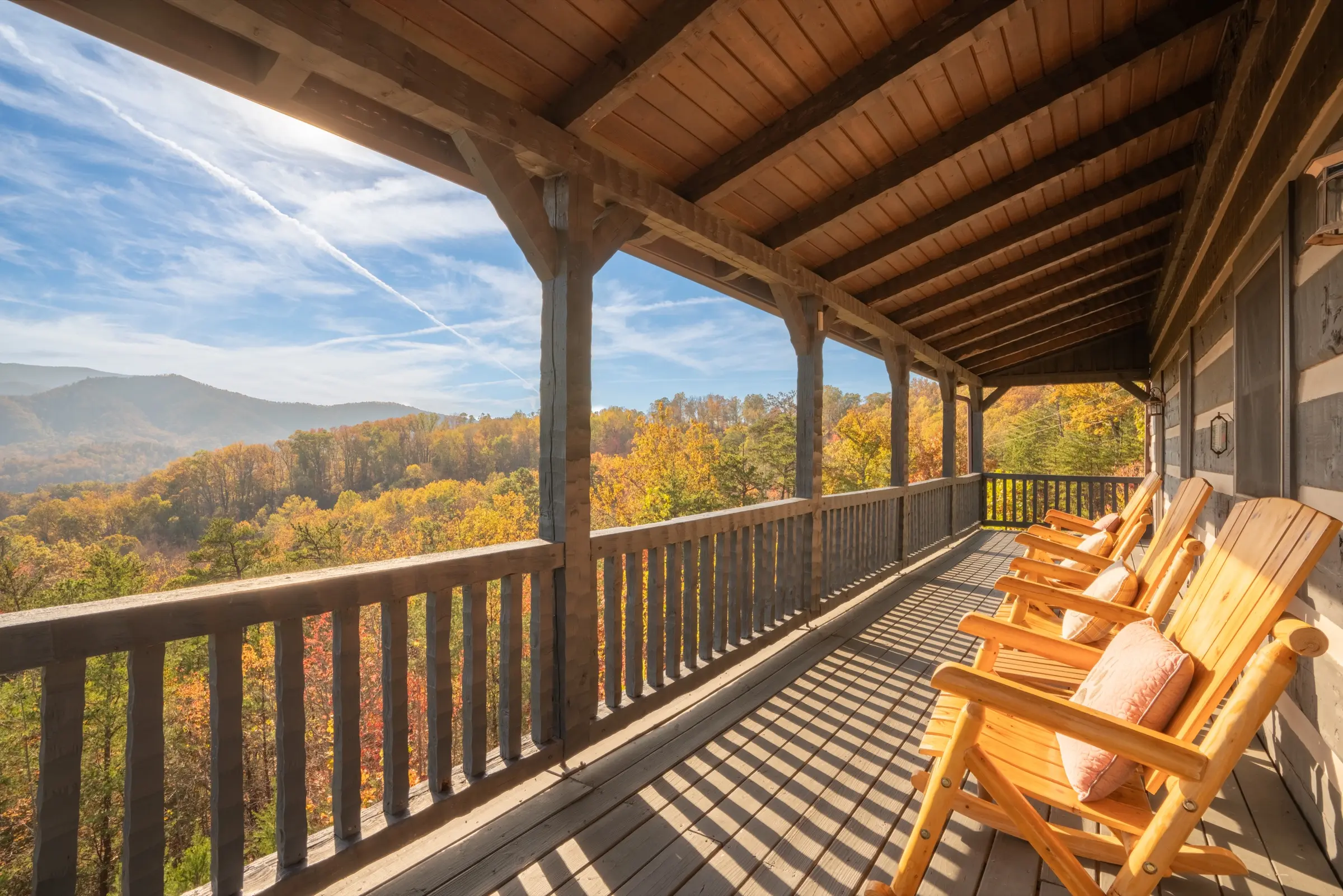 Back porch with rocking chairs and Mt. LeConte view