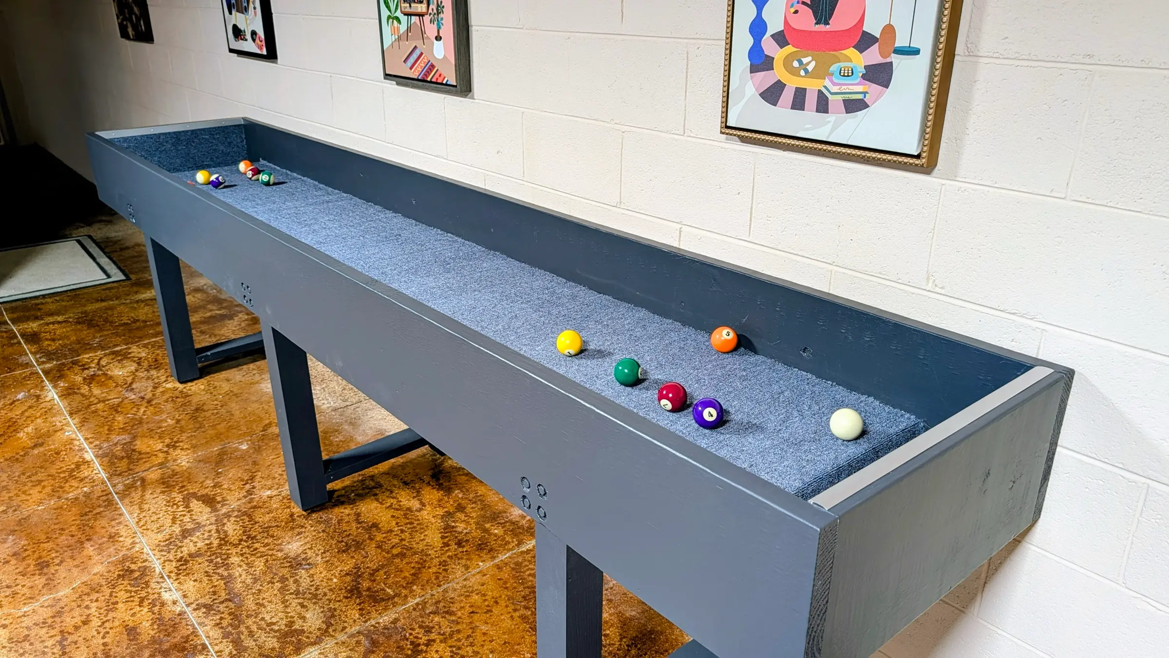 Carpetball table in the basement game room