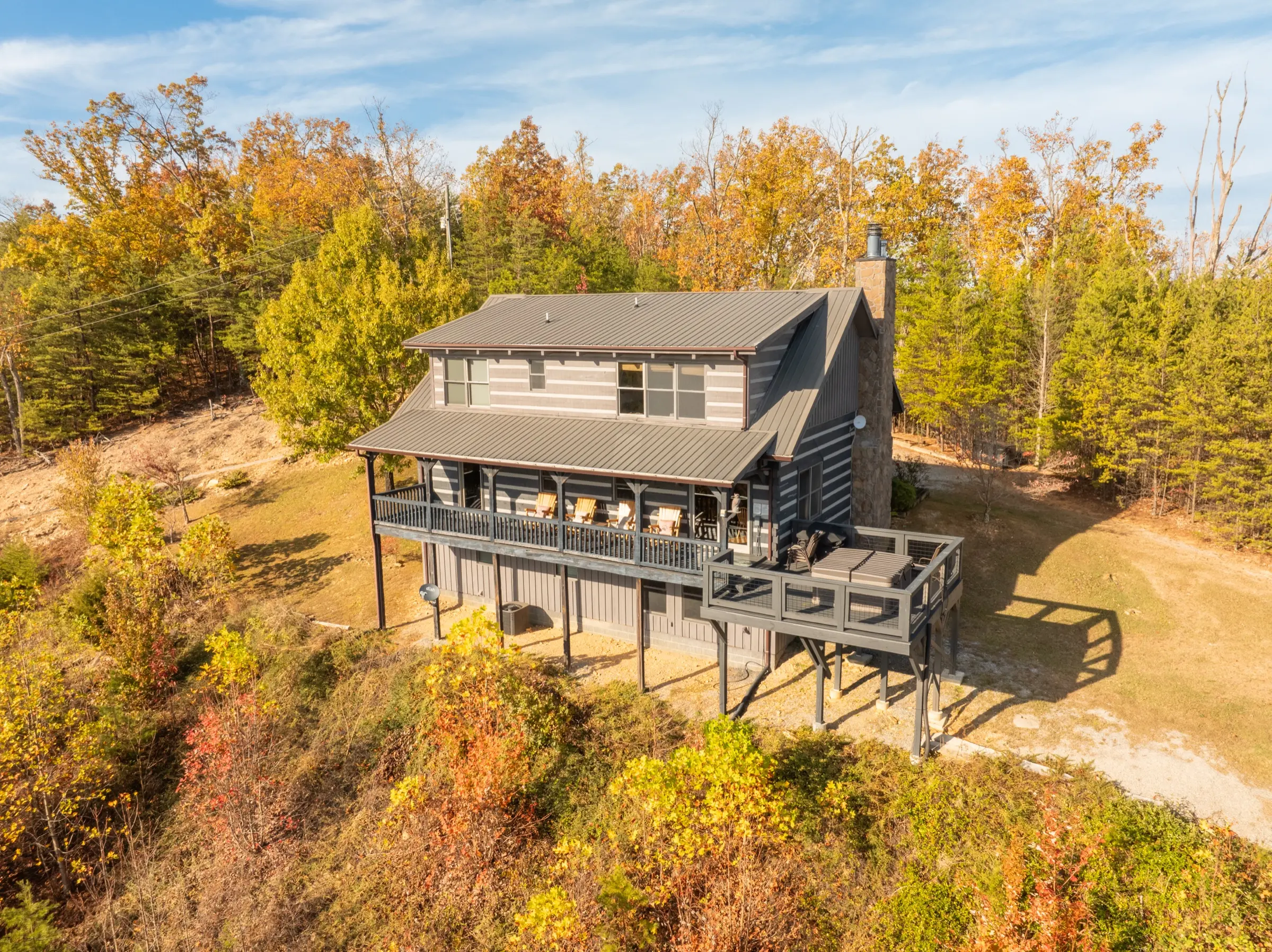Aerial view of cabin and 3 private acres