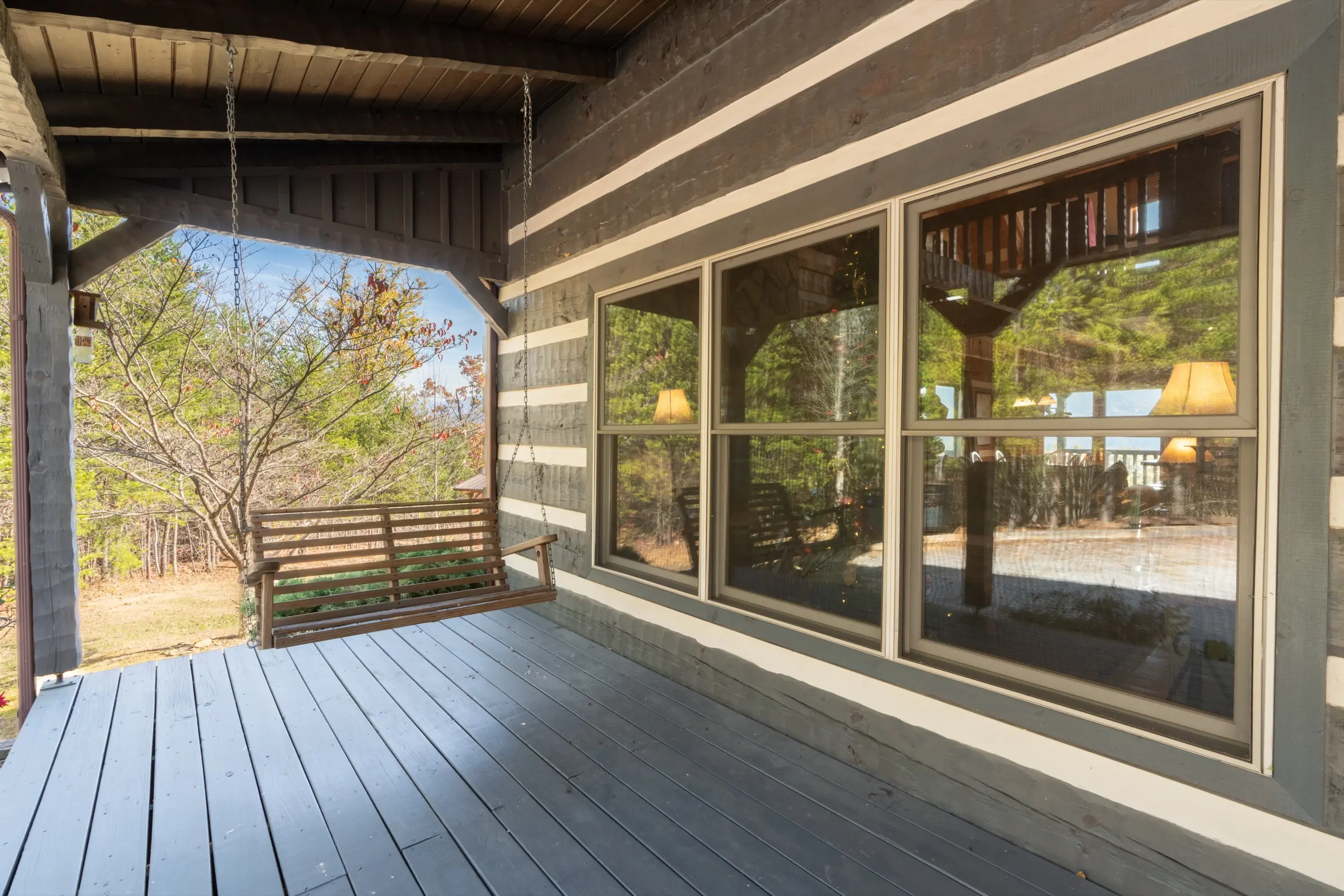 Covered front porch with twin swings