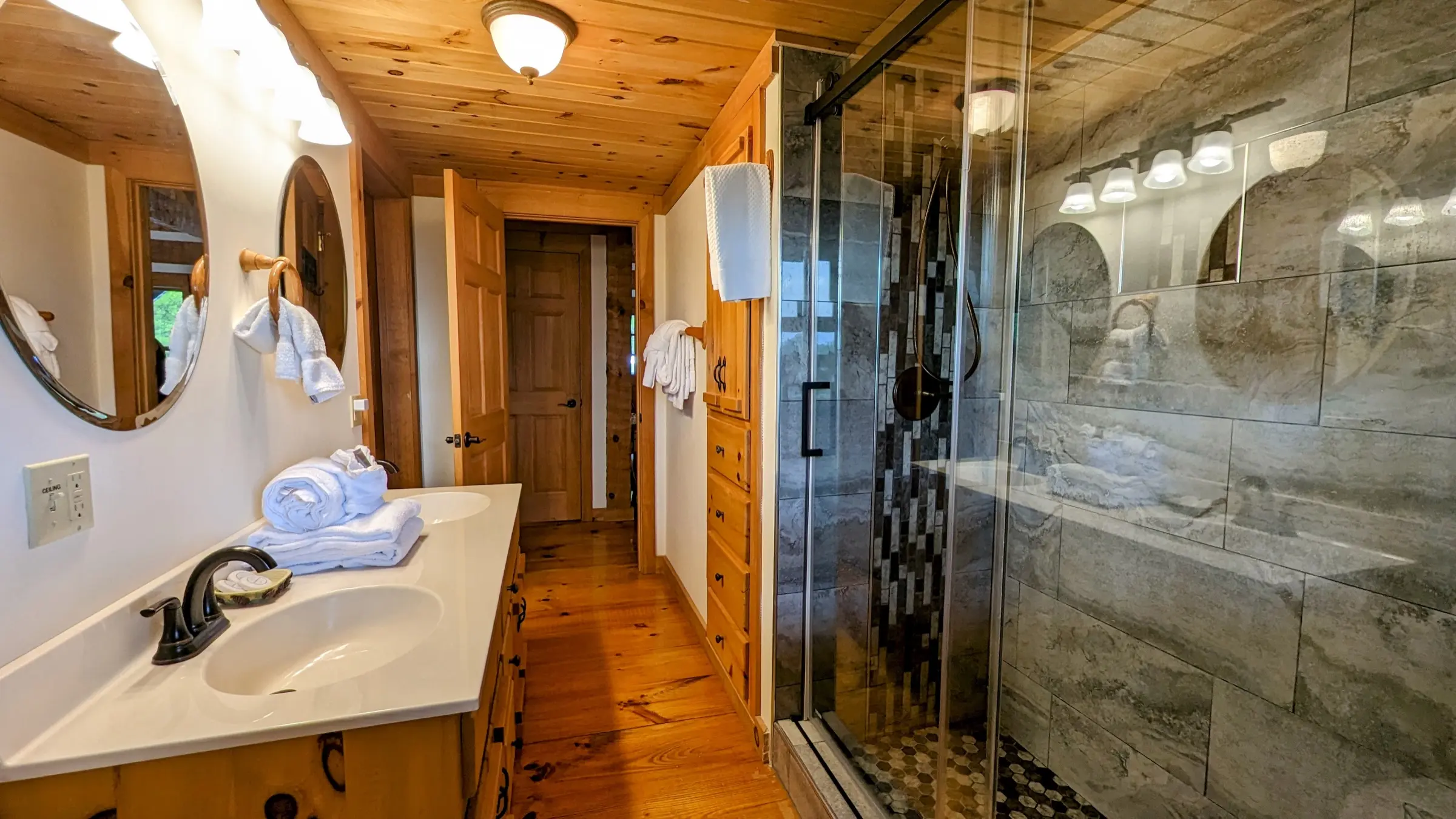 Master tile shower with glass doors